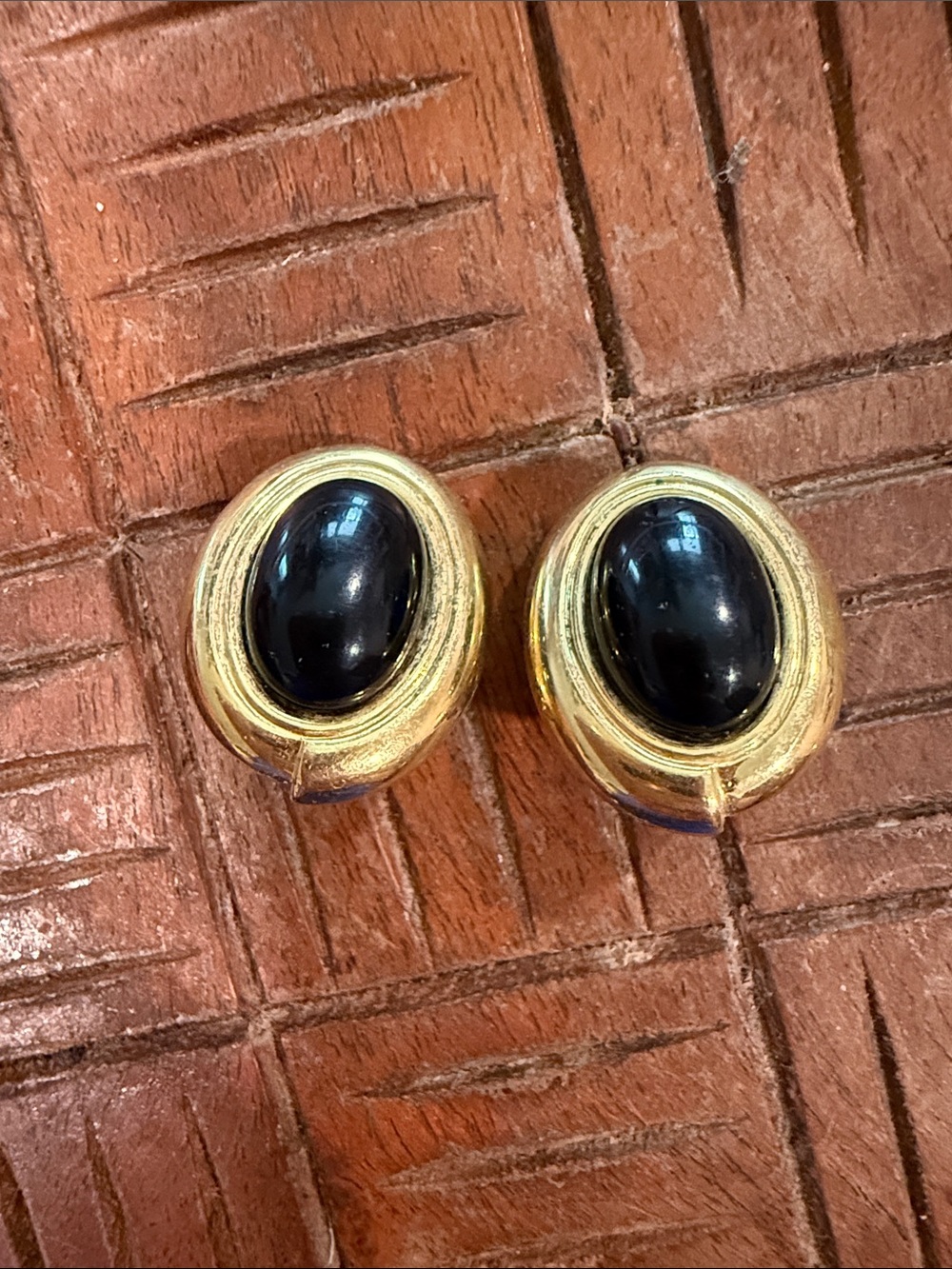 Vintage Monet Gold Tone Clip-on Earrings with Black Cabochons